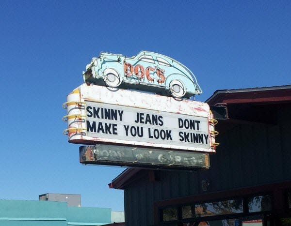 The signs at SXSW 2013 in Austin, TX are there to give us fashion advice.